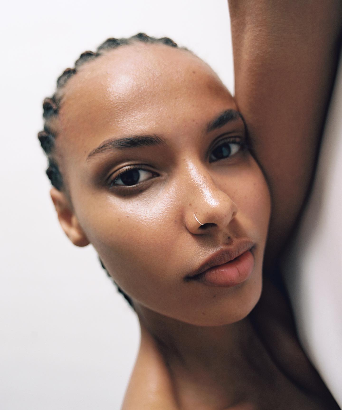 Microscope and lab glassware on table